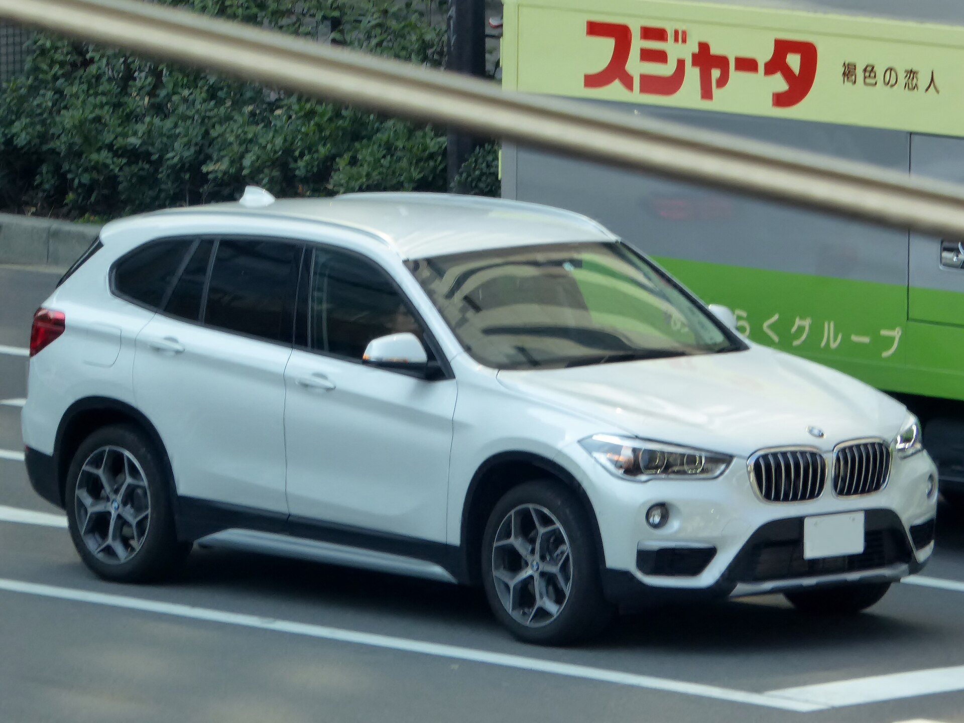 X1 F48 Sports Activity Vehicle in a real licensed photograph